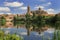 Salamanca Old and New Cathedrales reflected on Tormes River