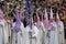 SALAMANCA, SPAIN - APRIL 18, 2019: Typical scene of the Spanish Holy Week, with religious dressing the typical Easter cap, music