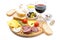 Salami, cheese, bread, olives, tomatoes and glass of red wine