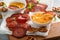 Salami chips baked in the oven with cheese sauces