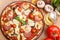 Salami, mushroom and vegetable pizza