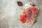 Salami, sliced ham, sausage, prosciutto, bacon. Meat antipasto platter, Antipasti Dinner or aperitivo party concept. place for