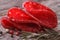 Salami sliced macro on the table with rosemary.