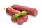 Salami smoked sausage, basil leaves and peppercorns isolated on