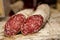 Salami is a type of cured sausage consisting of fermented and air-dried meat, typically beef or typical products of Emilia Romagna