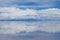 The Salar de Uyuni flooded after the rains, Bolivia. Clouds reflected in the water of the Salar de Uyuni, Bolivia