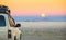 Salar De Uyuni at moon sunset - Adventure car trip in Bolivia