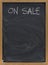 Sale advertisement on blackboard in vertical