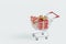 Sale background. Cart with gift boxes and heart, Trolley full of things bought on discount 3d render