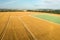 Sale field land for agribusiness. Land for sale and investment: Aerial drone shot with copy space.