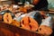 Sale of fresh fish catch, pieces of fish at the traditional urban market in the capital of the island of Mauritius, Port Louis