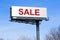 Sale on highway billboard sign