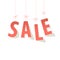 SALE paper letters Coral color hanging on threads on a white background