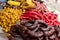 Sale of sausages and potatoes with skins in a Colombian street agricultural market.