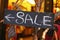 Sale sign inside a clothing store. Decorative background design