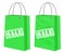 Sale signs on green kraft shopping paper bags