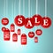 Sale signs and tag hanging in store for promotion & shopping