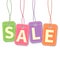 Sale tag on hanging multicolor labels