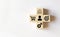 Sale volume increase make business success, Hand holding wood cube with icon goal and shopping cart symbol