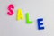 Sale Words Made from Colorful Letter Magnets