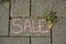 Sale written in chalk