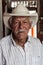 SALENTO, COLOMBIA - SEPTEMBER 8, 2015: Don Elias, owner of a small coffee farm in Salento village, Colomb