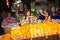 Sales booth with saleswomen at the flower market Pak Khlong Thalat in Bangkok