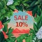 Sales flyer with the inscription sale 10%, tropical background, summer sale