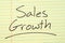 Sales Growth On A Yellow Legal Pad