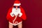 Sales, marketing,selling time Santa is dropped pants with hands on head thinking something.Red studio background