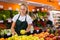 Salesgirl at her first job in vegetable shop