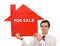 Salesman with house for sale sign