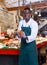 Salesman offering fresh fish