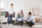 Salesman showing family section of mattress