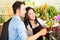 Saleswoman and customer in flower shop