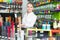 saleswoman working behind counter