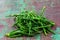 Salicornia, sea beans, marine cornice appetizer. This delicious appetizer on wooden table.