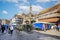 Salisbury Saturday Market stalls around historic Poultry Cross in Salisbury, Wiltshire, UK