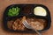 Salisbury steak tv dinner with a fork