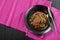 Salisbury steaks on plates, top view