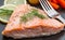 Salmon fillet with baked onion and carrot