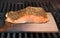 Salmon Fillet on Cedar Plank Smoke Cooking on BBQ