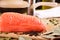 Salmon fillet and a frying pan on the table