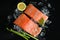 salmon fillet with lemon asparagus herb and spices, fresh raw salmon fish on ice for cooking food seafood salmon fish - top view