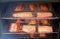 Salmon fillets smoking in a smoker