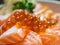 Salmon Ikura Don, selective focus on salmon roe
