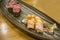 Salmon Nigiri sushi and Hamachi sashimi shushi, focus selective
