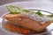 Salmon with roasted skin and orange caviar