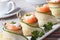 Salmon rolls with cucumber, cream cheese and herbs