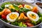 Salmon salad - smoked salmon hard boiled eggs and green vegetables on wooden table